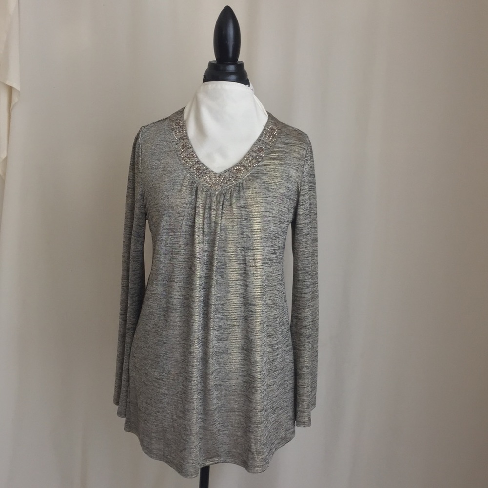 One World V-neck long sleeved black and gold top.